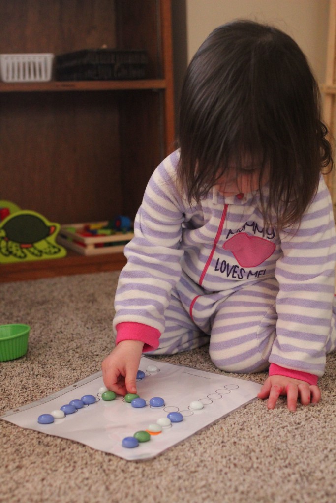 Here are a handful of toddler montessori-inspired activities we tried at home. They're pretty easy to set up and very cheap or free. Great for a 2 year old!